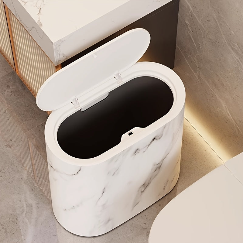 Modern oval lidded trash can with decorative patterned exterior