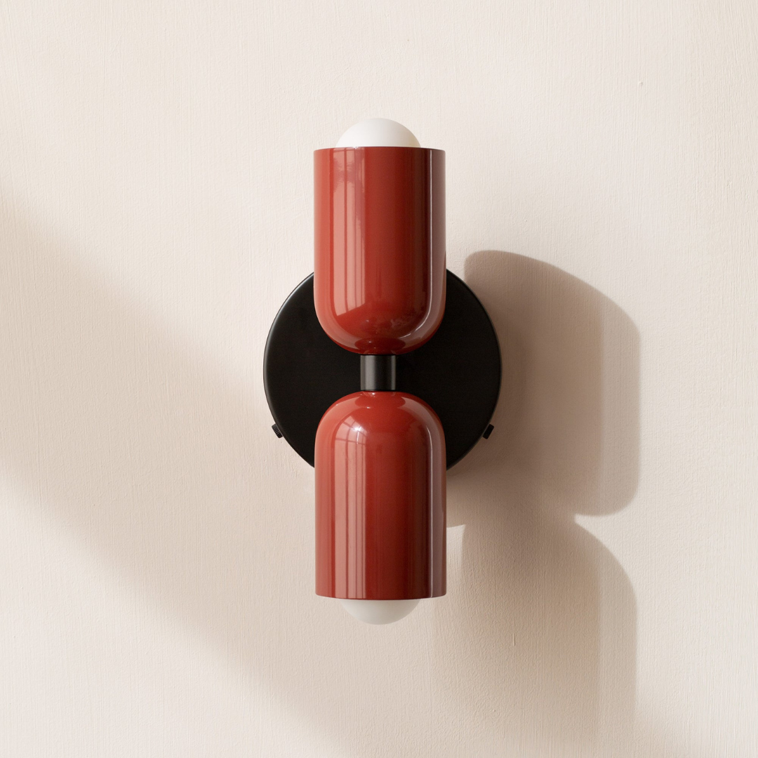 Modern two-light LED cylinder wall sconce with round backplate
