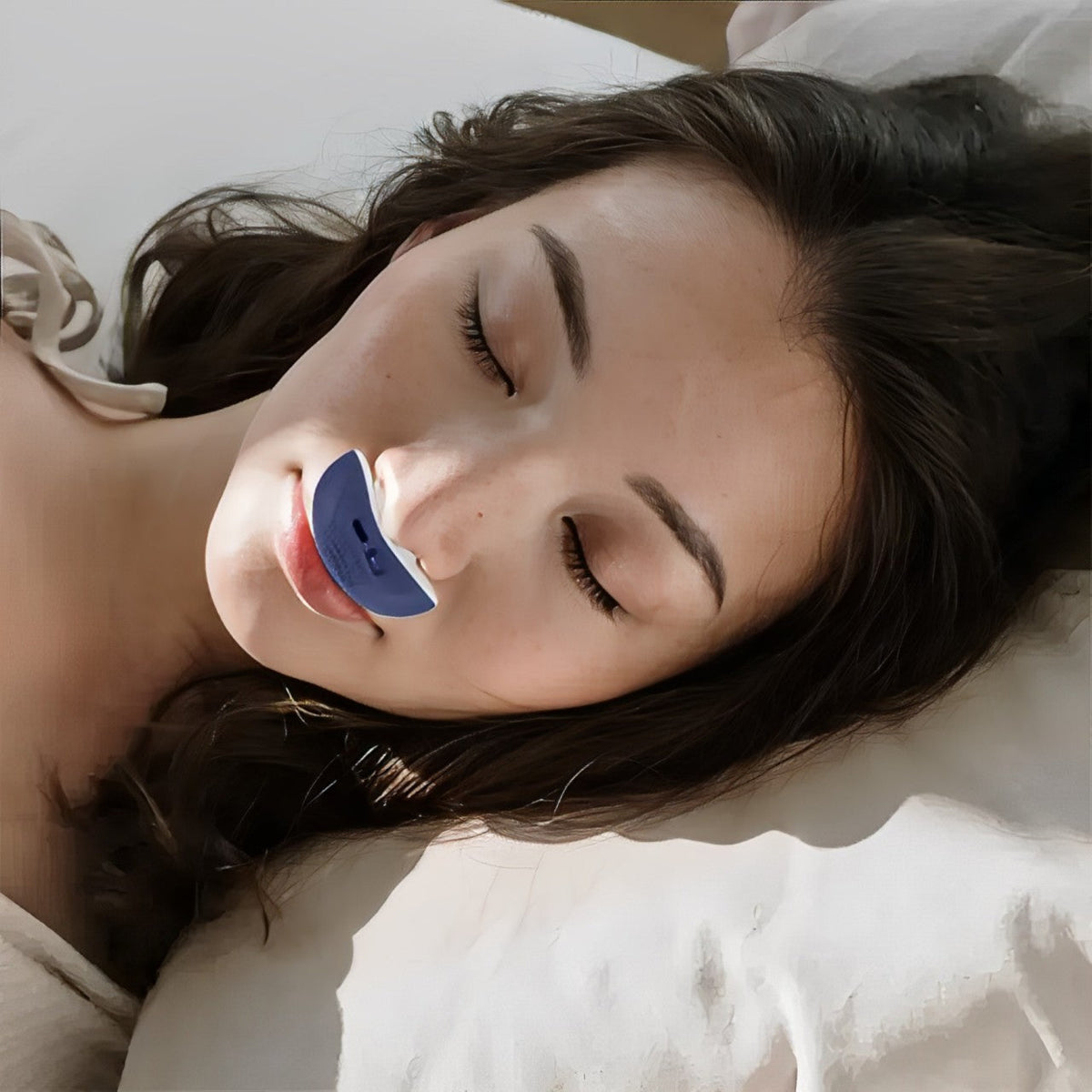 Compact rechargeable anti-snoring device with twin fans and silicone nasal components