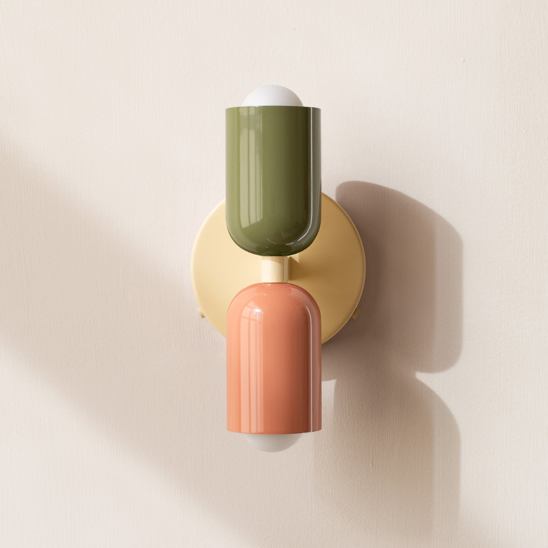 Modern two-light LED cylinder wall sconce with round backplate