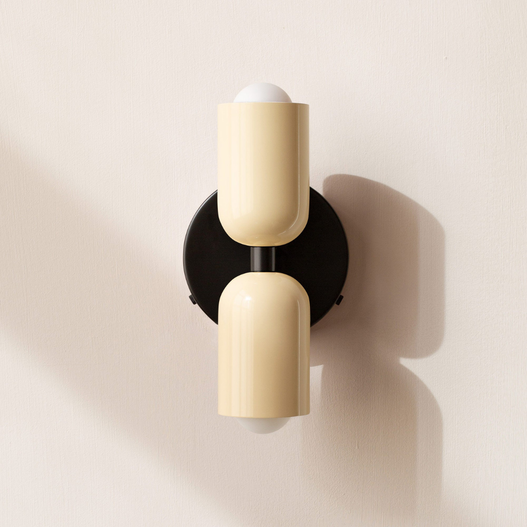 Modern two-light LED cylinder wall sconce with round backplate