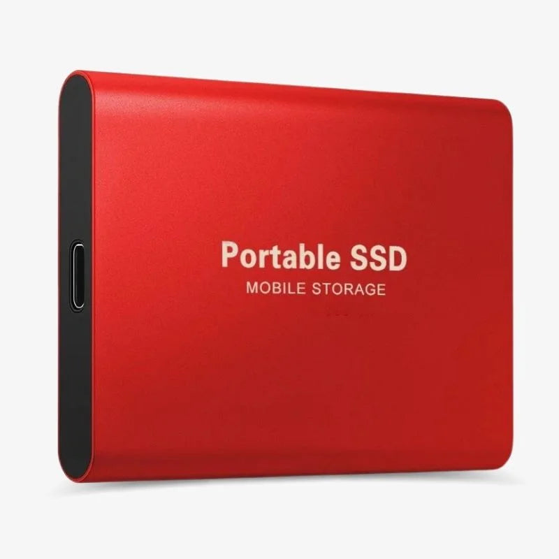 Portable SSD connected to a laptop by USB cable