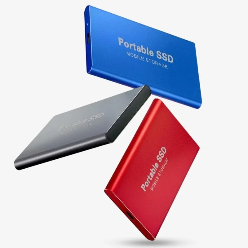Portable SSD connected to a laptop by USB cable