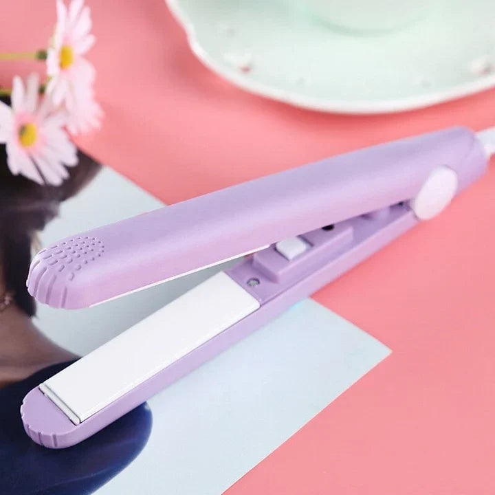 Compact mini hair straightener and curling iron in blue and pink