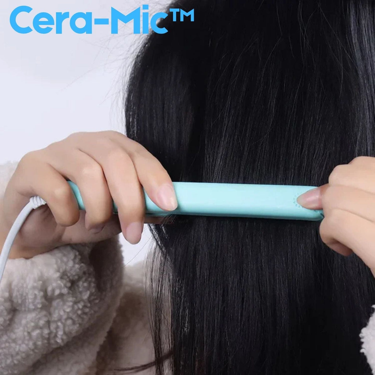 Compact mini hair straightener and curling iron in blue and pink