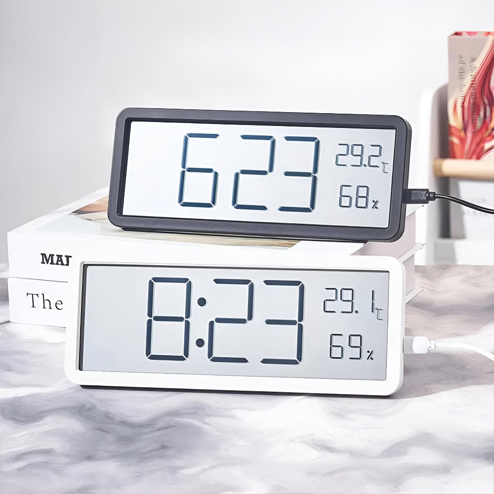 Digital wall clock displaying time, temperature, and humidity