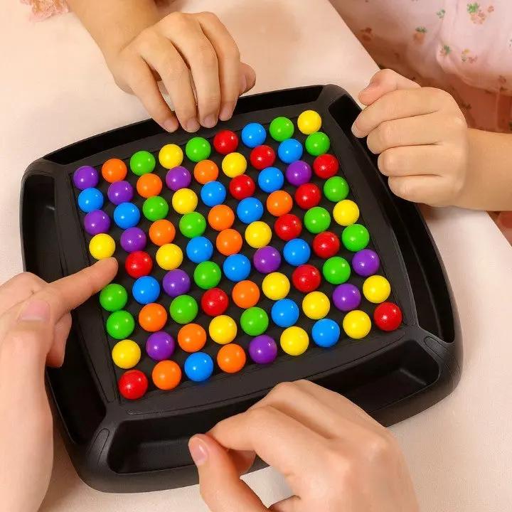 Black screen-free strategy board game with colorful round game pieces
