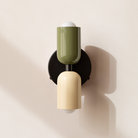 Modern two-light LED cylinder wall sconce with round backplate