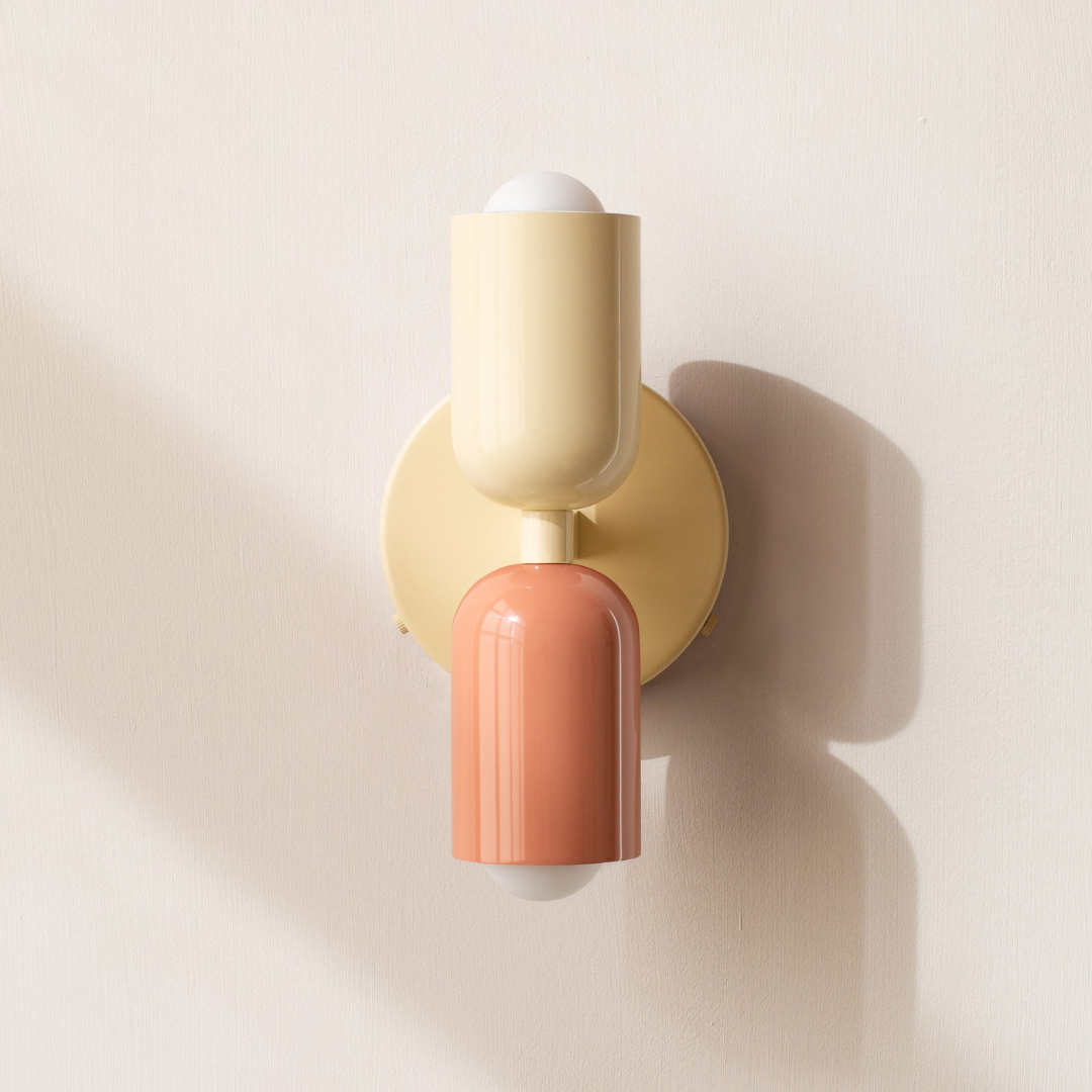 Modern two-light LED cylinder wall sconce with round backplate