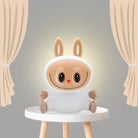 Bunny character night light on a round tabletop base