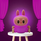 Bunny character night light on a round tabletop base