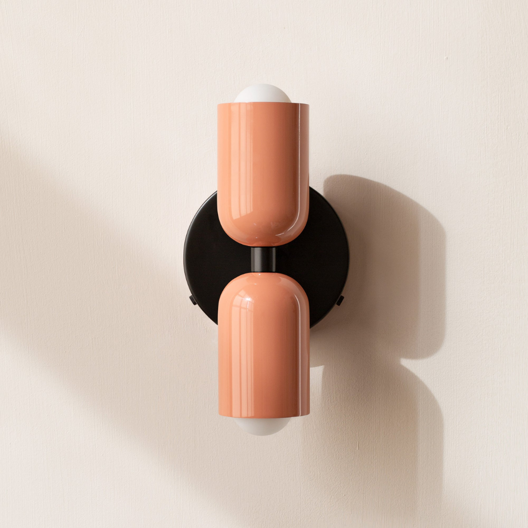 Modern two-light LED cylinder wall sconce with round backplate