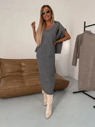 Women's midi dress set styled with a matching turtleneck sweater