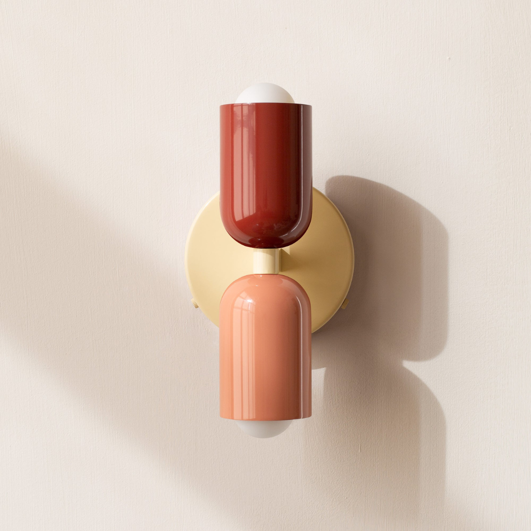 Modern two-light LED cylinder wall sconce with round backplate