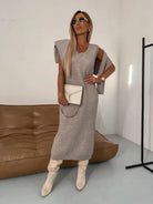 Women's midi dress set styled with a matching turtleneck sweater