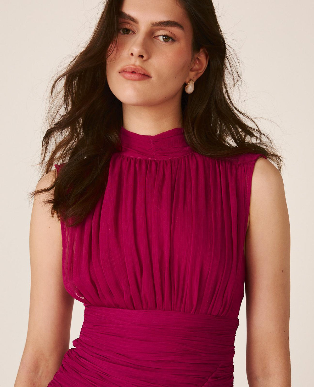 Women's pink sleeveless mock-neck maxi dress with ruched waist and layered ruffles