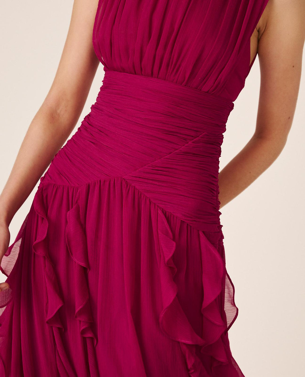 Women's pink sleeveless mock-neck maxi dress with ruched waist and layered ruffles