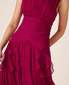 Women's pink sleeveless mock-neck maxi dress with ruched waist and layered ruffles