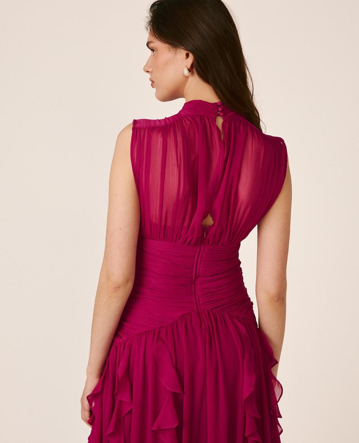 Women's pink sleeveless mock-neck maxi dress with ruched waist and layered ruffles