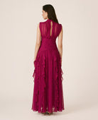 Women's pink sleeveless mock-neck maxi dress with ruched waist and layered ruffles
