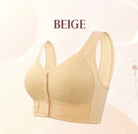 Women's wireless bra with molded cups, wide straps and front button closure