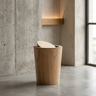 Brown timber-style rotating waste bin with pivoting lid
