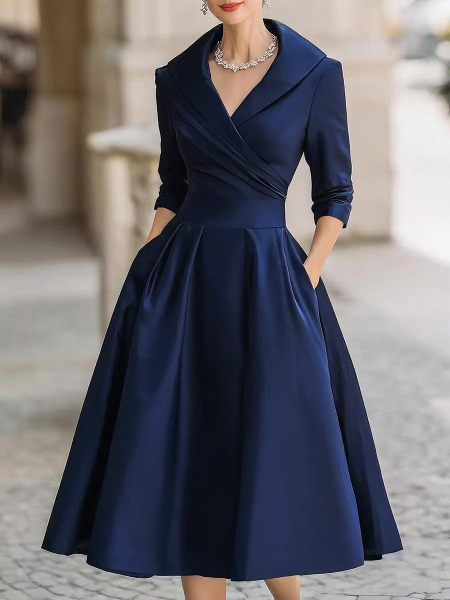 Women's wrap A-line midi dress with long sleeves, full skirt and side pockets