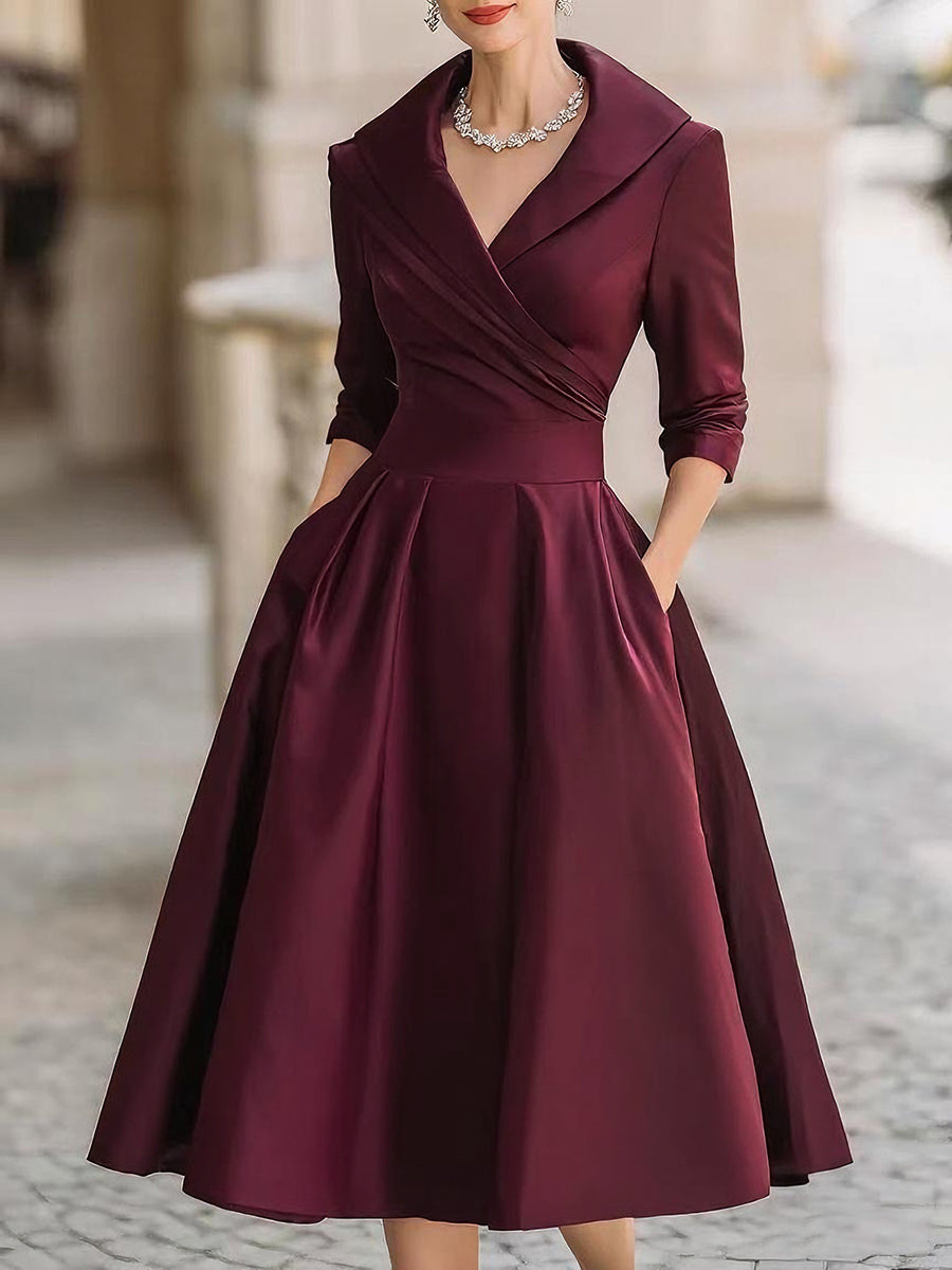 Women's wrap A-line midi dress with long sleeves, full skirt and side pockets