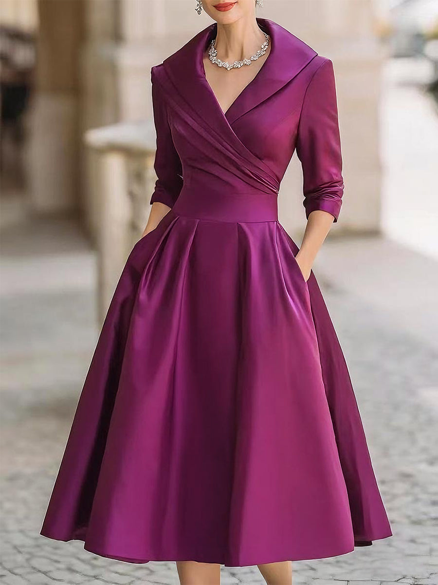 Women's wrap A-line midi dress with long sleeves, full skirt and side pockets