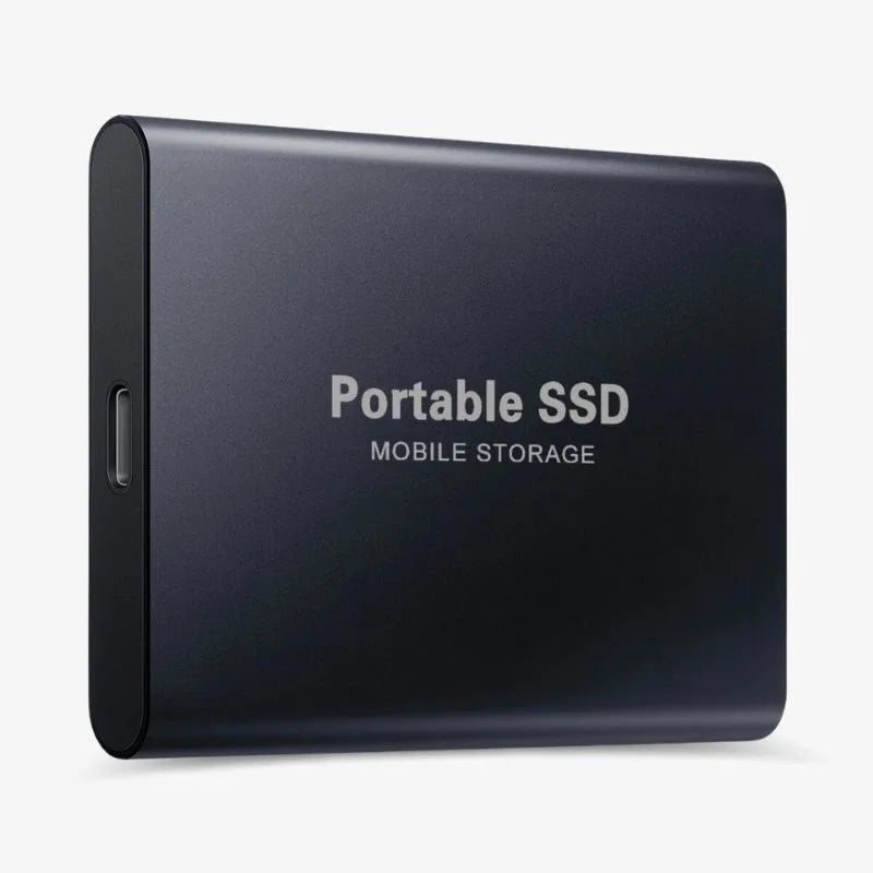 Portable SSD connected to a laptop by USB cable