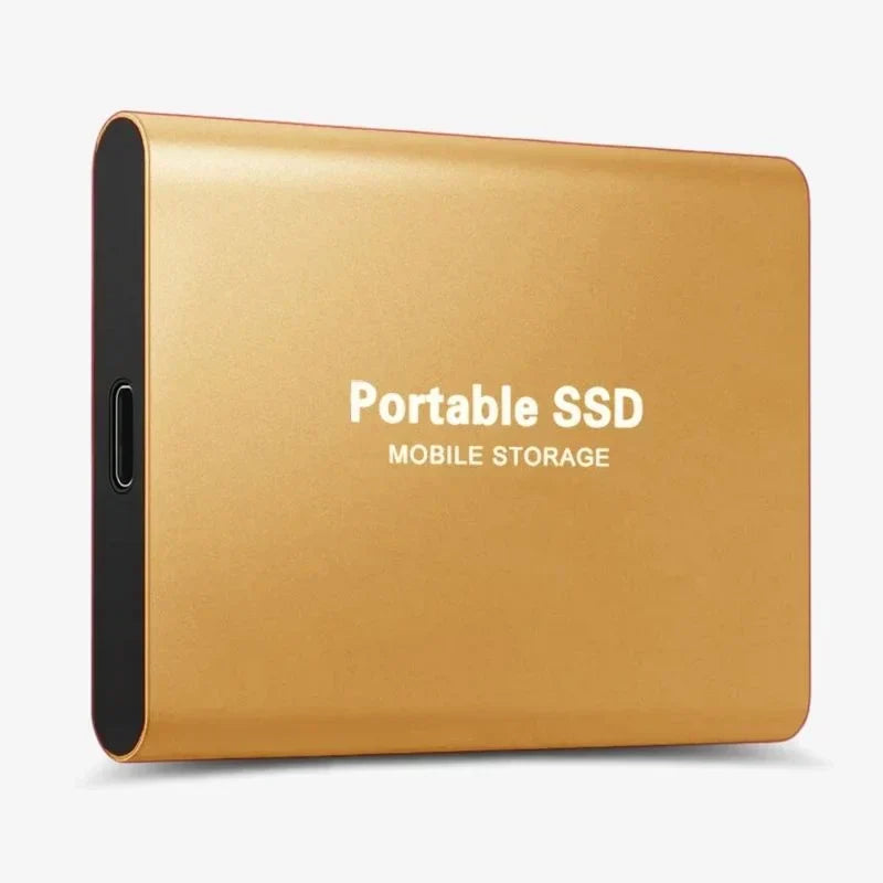 Portable SSD connected to a laptop by USB cable