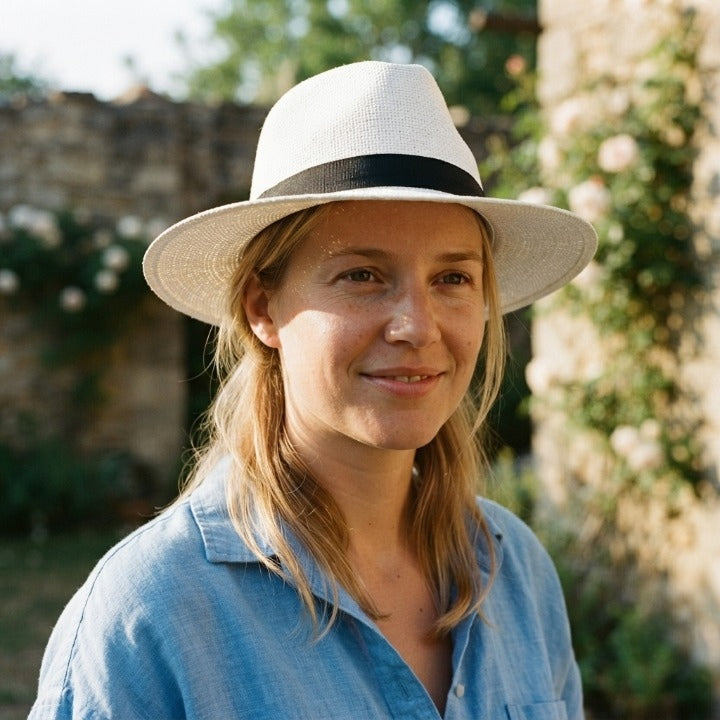Handwoven straw fedora hat with a wide brim and contrasting band