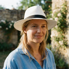Handwoven straw fedora hat with a wide brim and contrasting band