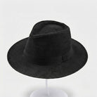 Handwoven straw fedora hat with a wide brim and contrasting band