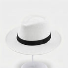 Handwoven straw fedora hat with a wide brim and contrasting band