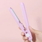 Compact mini hair straightener and curling iron in blue and pink