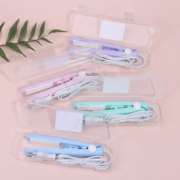 Compact mini hair straightener and curling iron in blue and pink