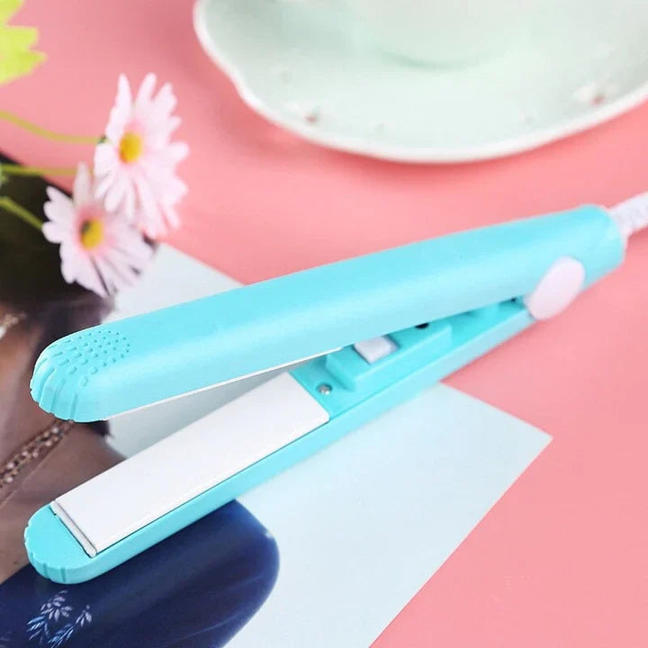 Compact mini hair straightener and curling iron in blue and pink
