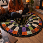 Round Halloween 3D illusion area rug with bold geometric pattern