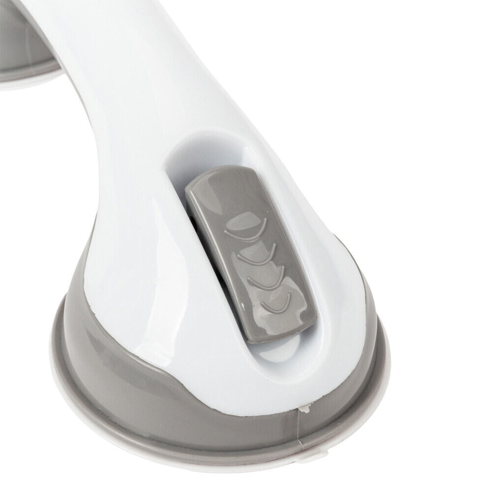White and gray no-drill bathroom grab bar mounted on a tiled shower wall