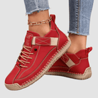 Women's lace-up walking sneakers with ankle design and flat sole