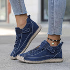 Women's lace-up walking sneakers with ankle design and flat sole