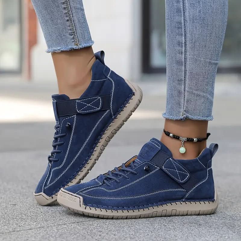 Women's lace-up walking sneakers with ankle design and flat sole