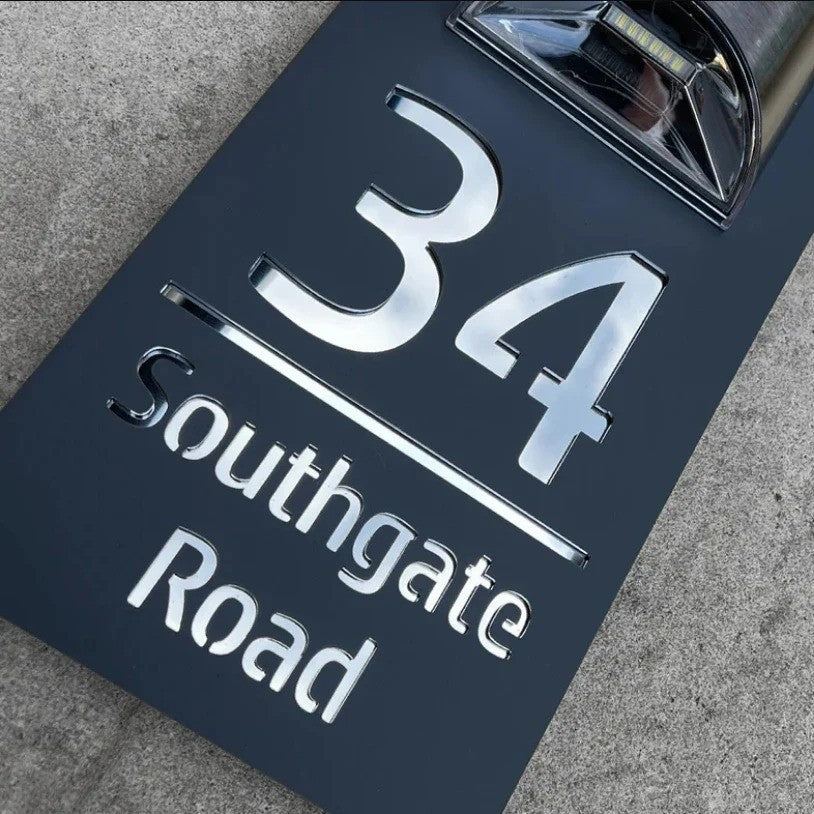 Personalized rectangular house number plaque with raised metallic lettering