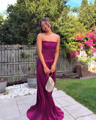 Berry glitter strapless maxi dress with fitted bodice and floor-length flared hem