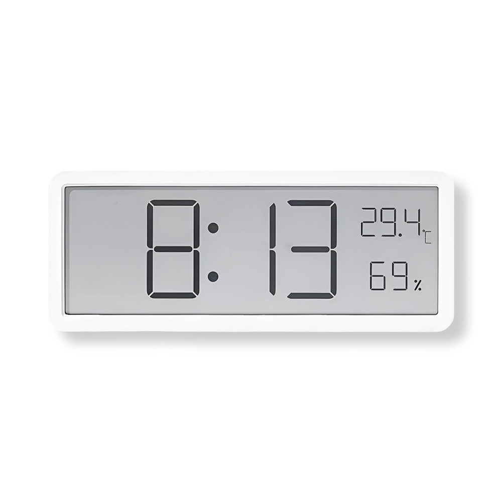 Digital wall clock displaying time, temperature, and humidity