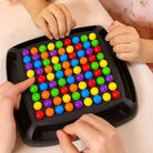 Black screen-free strategy board game with colorful round game pieces
