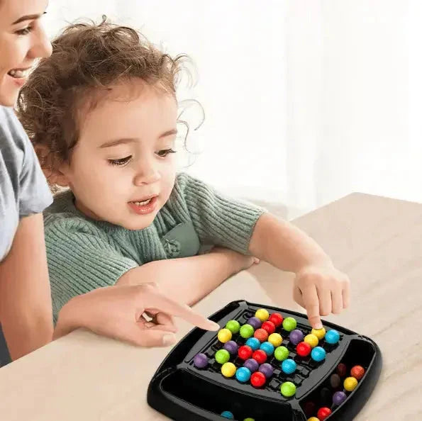 Black screen-free strategy board game with colorful round game pieces