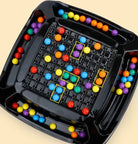 Black screen-free strategy board game with colorful round game pieces