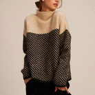 Women's relaxed turtleneck sweater with geometric chevron pattern and long sleeves